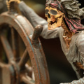 Skeleton helmsman figure